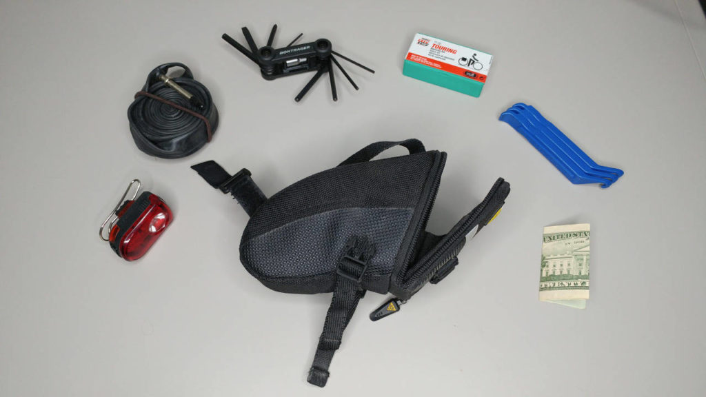 saddle bag and contents on table